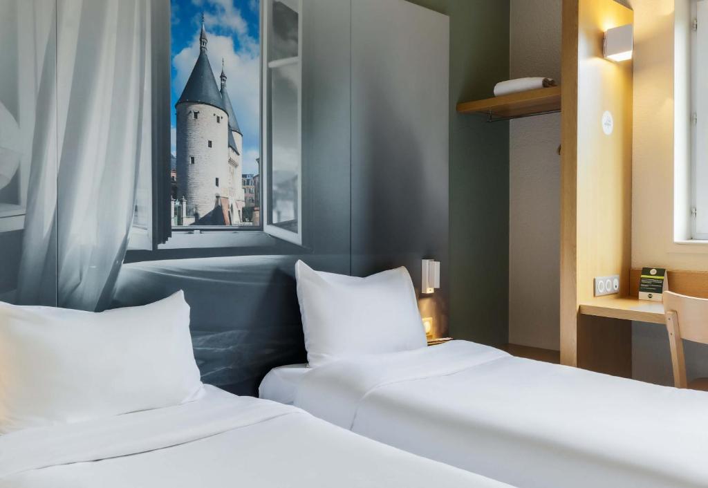 Postel nebo postele na pokoji v ubytování B&B HOTEL Nancy Laxou Zenith