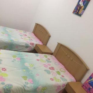 Postel nebo postele na pokoji v ubytování maison d'hôte familiale للعائلات فقط