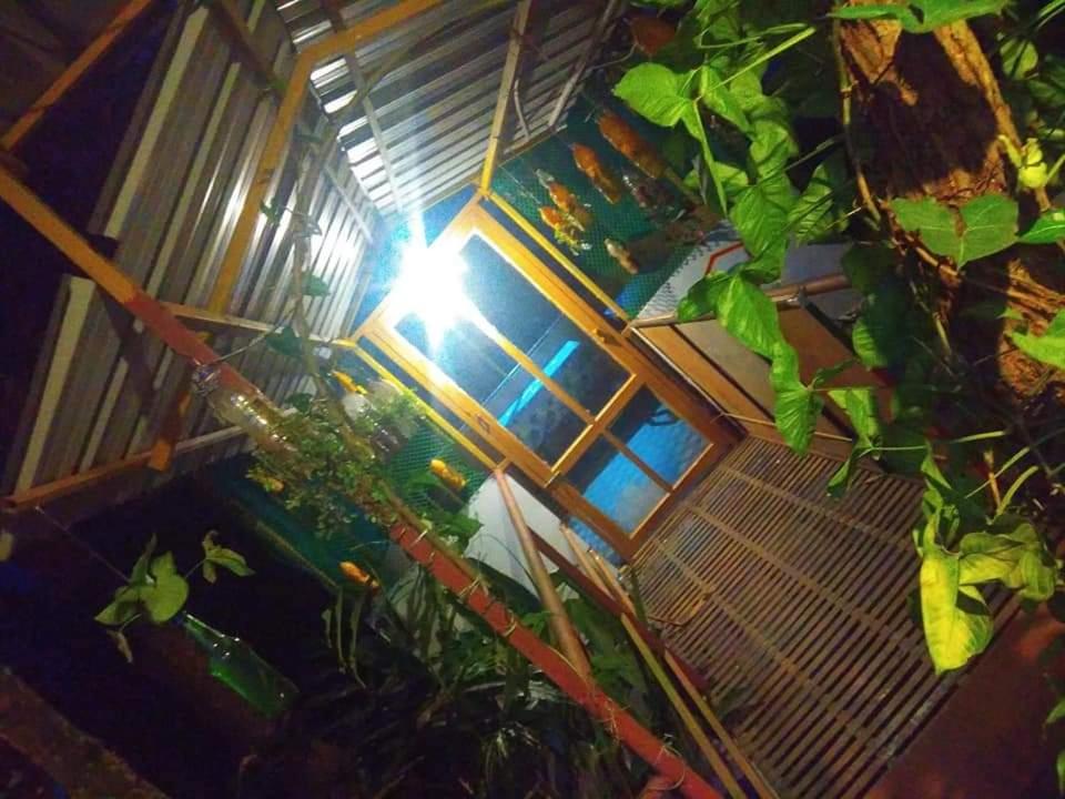 an overhead view of a building with a street light at Munnar home stay Teadrops plantation villa in Munnar