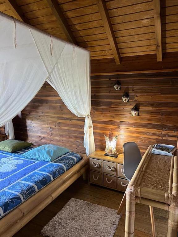 Postel nebo postele na pokoji v ubytování Le Neem