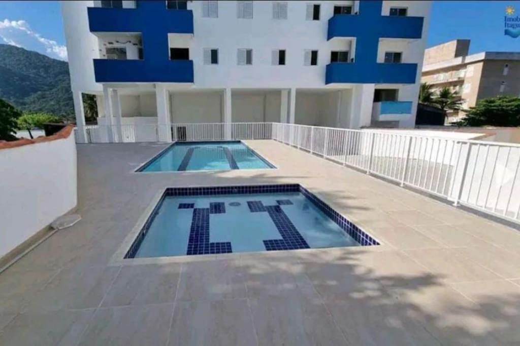 Басейн в Apartamento com piscina em UBATUBA або поблизу