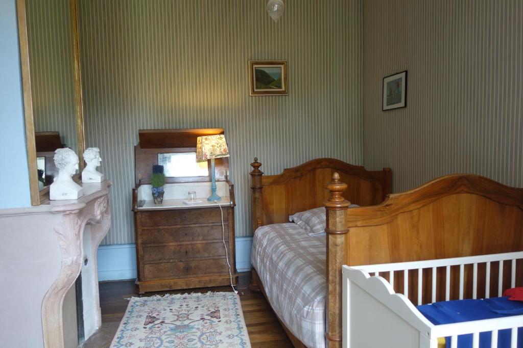 Postel nebo postele na pokoji v ubytování Château de Mauvilly