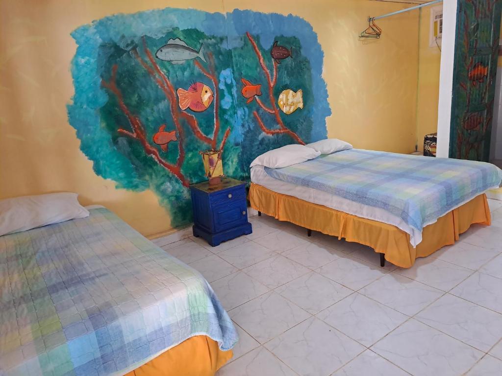 Postel nebo postele na pokoji v ubytování Villa Bella