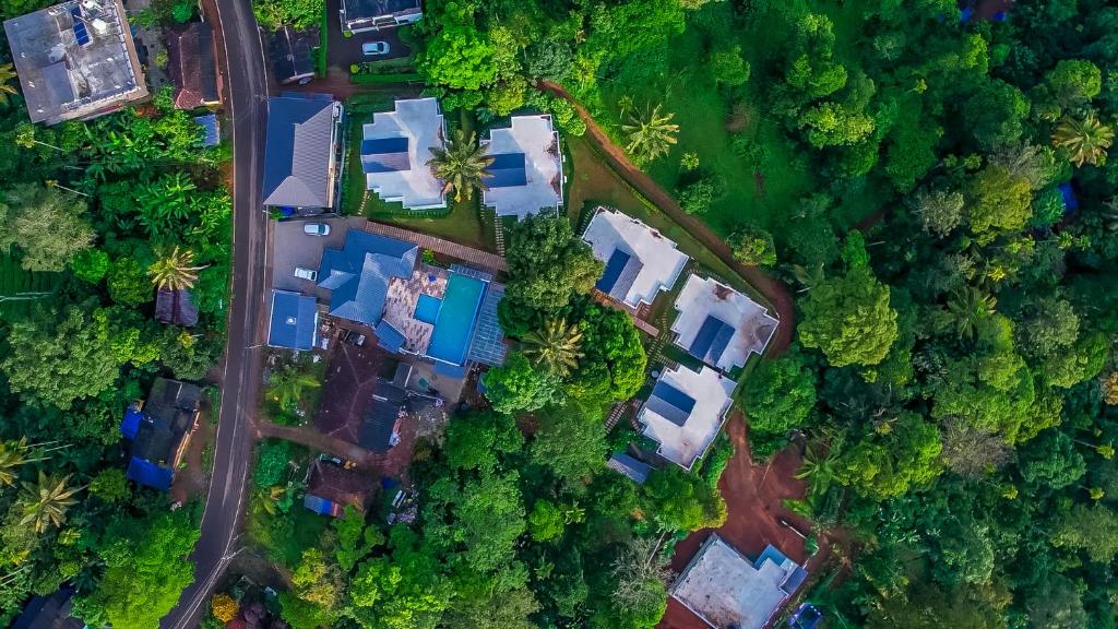 an overhead view of a yard with houses and trees at Winter Note Resorts in Munnar