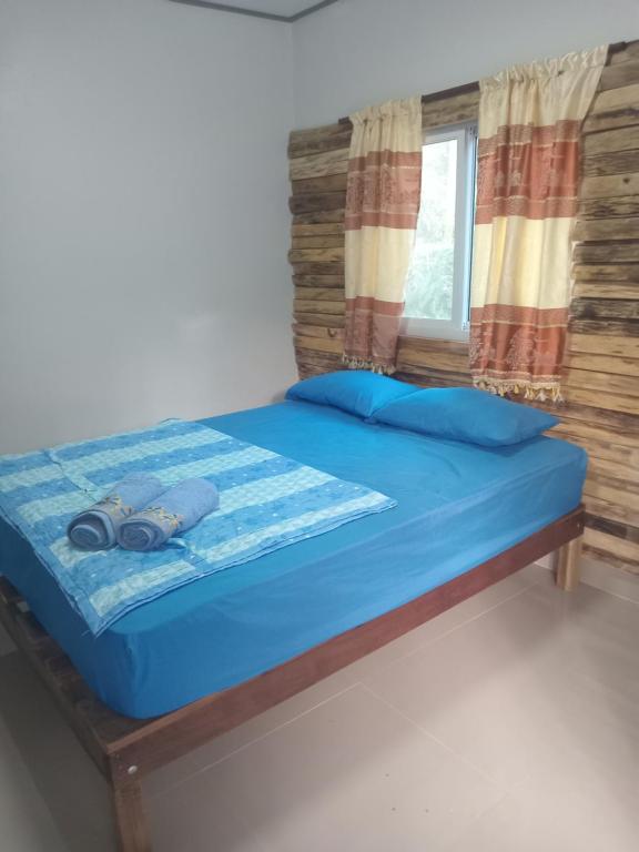 Chom Suan Farmstayにあるベッド