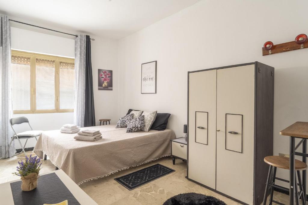 Postel nebo postele na pokoji v ubytování Jerzu Centro