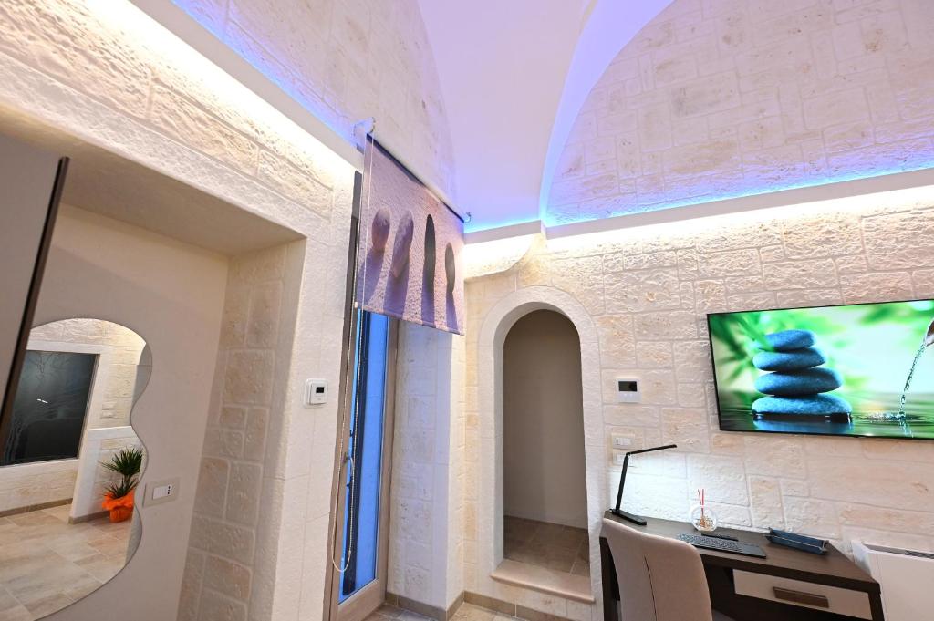TV a/nebo společenská místnost v ubytování Suite Laurel SPA con idromassaggio