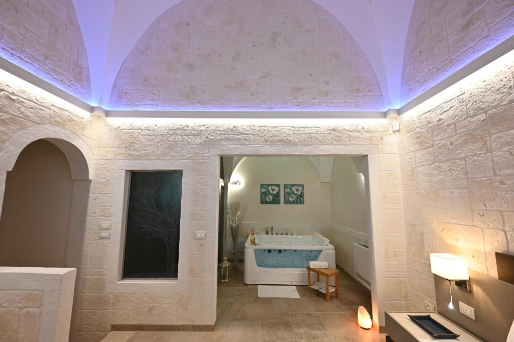 Postel nebo postele na pokoji v ubytování Suite Laurel SPA con idromassaggio