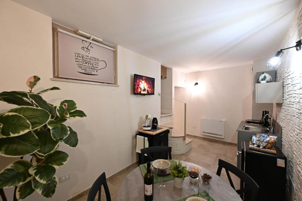 Kuchyň nebo kuchyňský kout v ubytování Suite Laurel SPA con idromassaggio