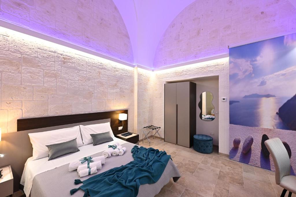 Postel nebo postele na pokoji v ubytování Suite Laurel SPA con idromassaggio