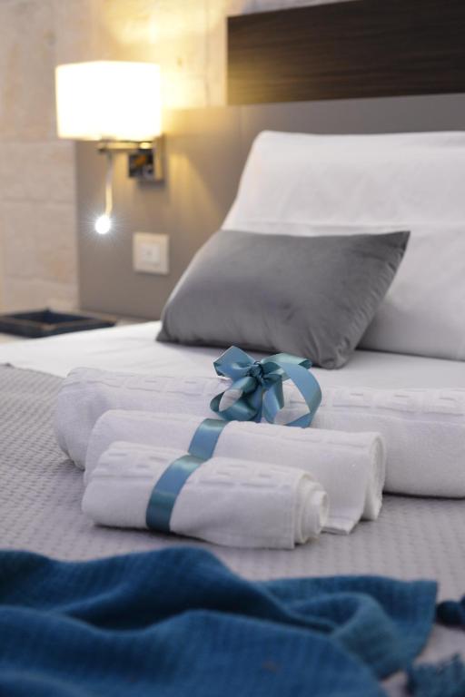 Postel nebo postele na pokoji v ubytování Suite Laurel SPA con idromassaggio