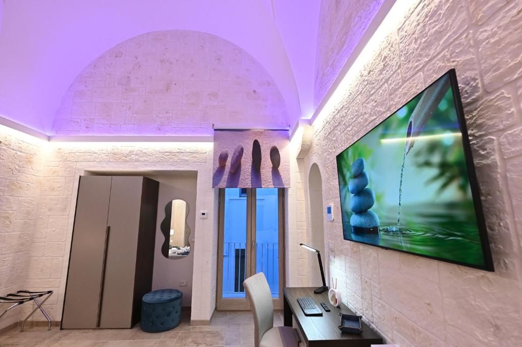 TV a/nebo společenská místnost v ubytování Suite Laurel SPA con idromassaggio