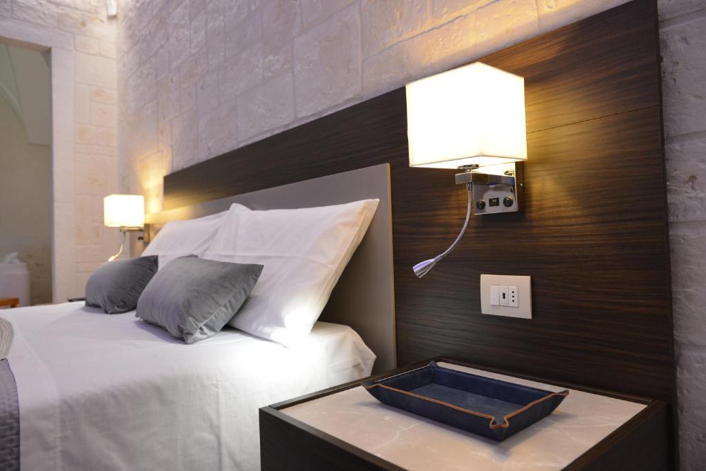 Postel nebo postele na pokoji v ubytování Suite Laurel SPA con idromassaggio