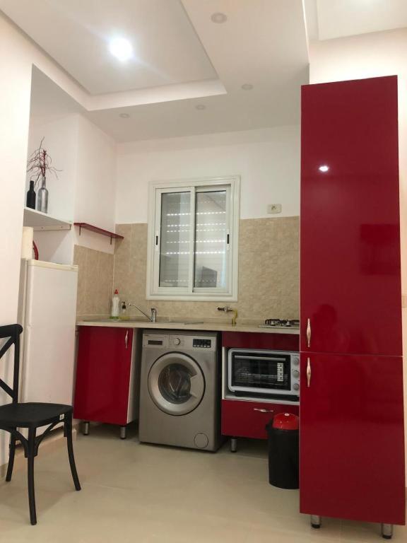 Kuchyň nebo kuchyňský kout v ubytování maison d'hôte familiale للعائلات فقط