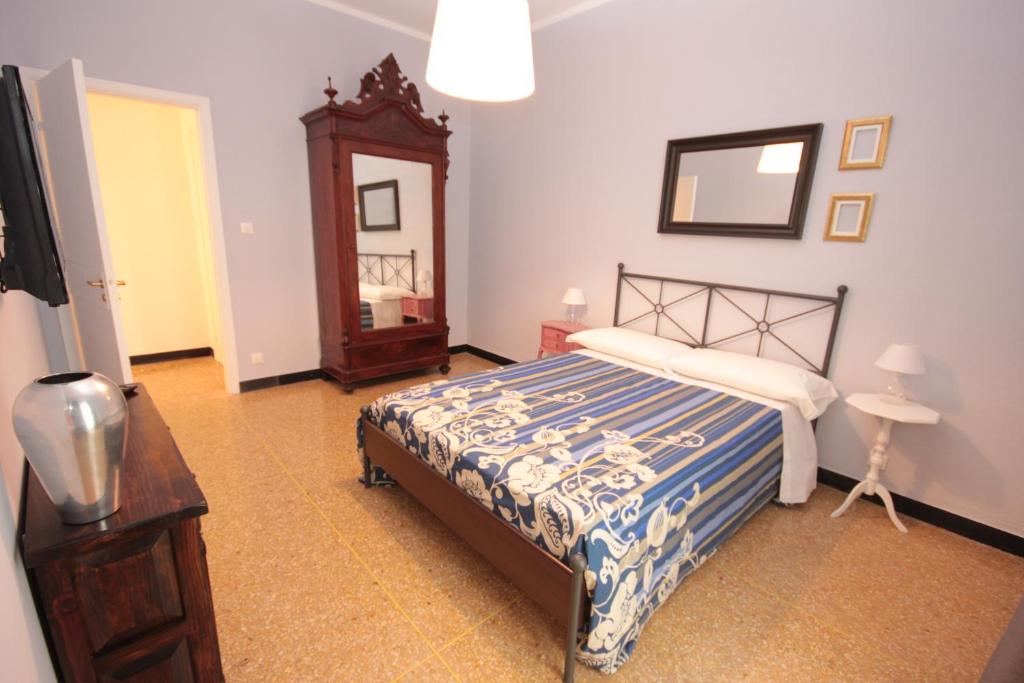 Postel nebo postele na pokoji v ubytování B&B I Portici Di Sottoripa