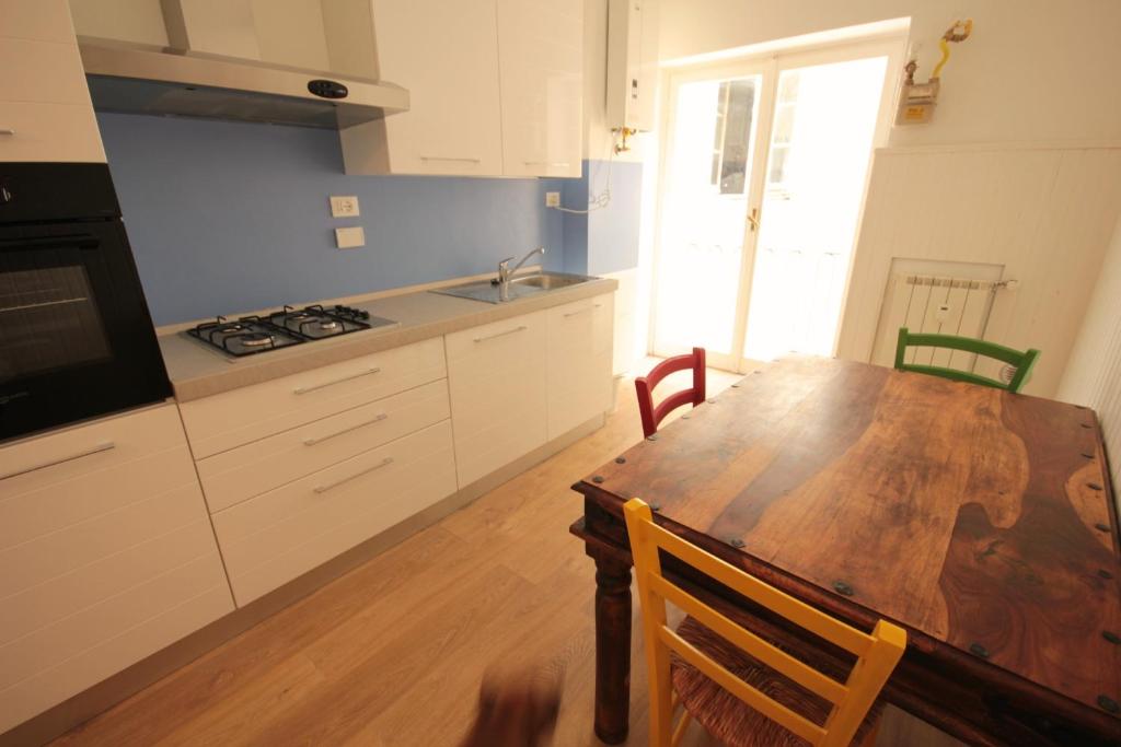Kuchyň nebo kuchyňský kout v ubytování B&B I Portici Di Sottoripa