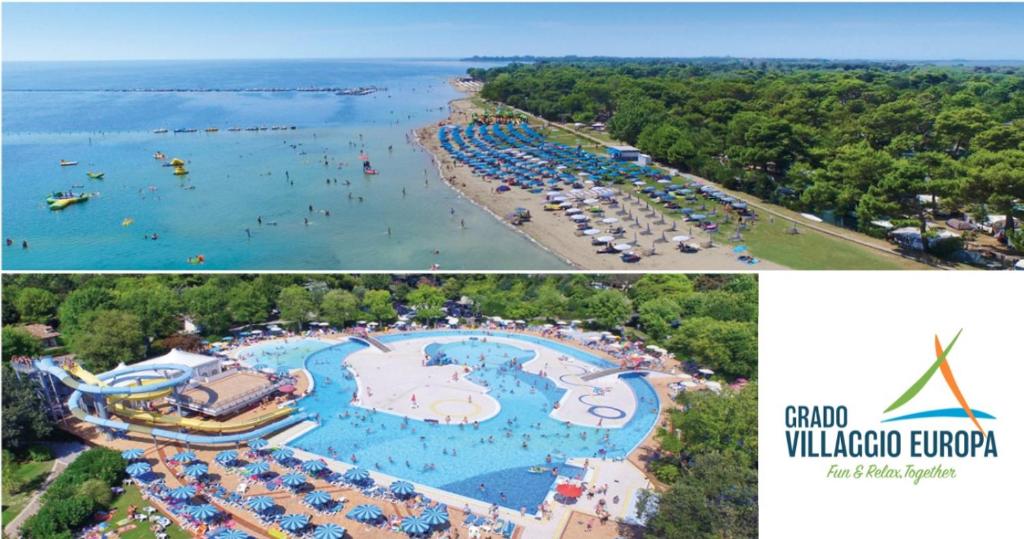 uma vista aérea de uma piscina num parque aquático em Villaggio Turistico Europa em Grado