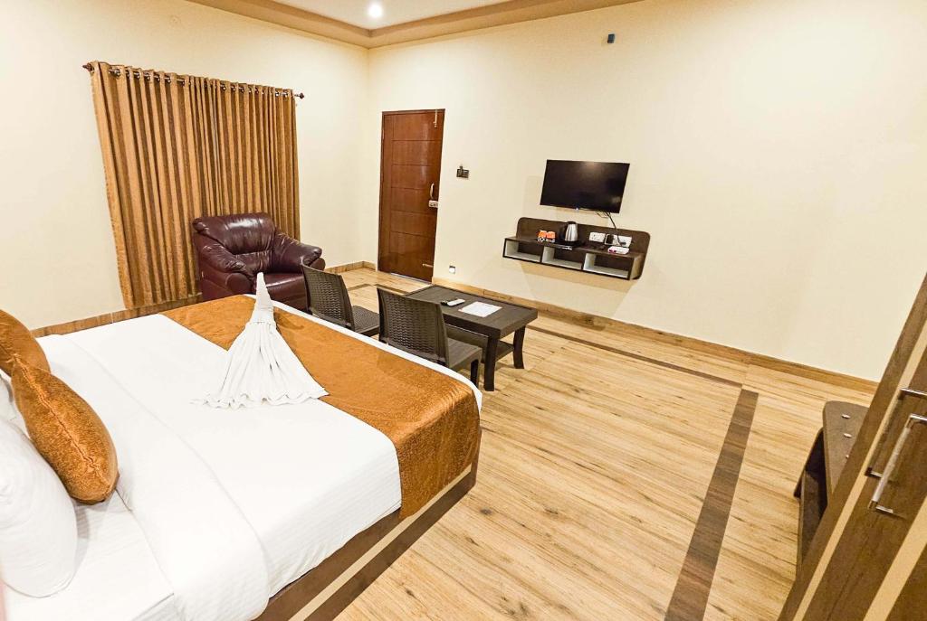 TV a/nebo společenská místnost v ubytování IHotels Yercaud