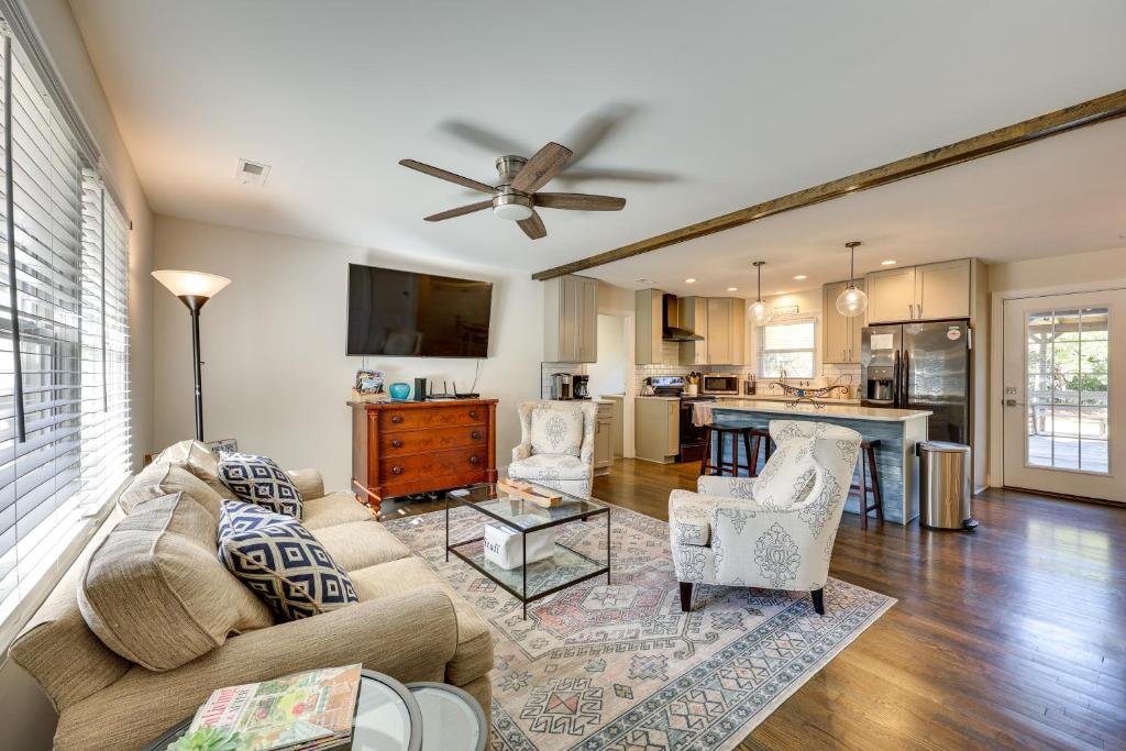 a living room with a couch and a table at Wilmington Home with Gazebo Deck 4 Mi to Beach! in Wilmington