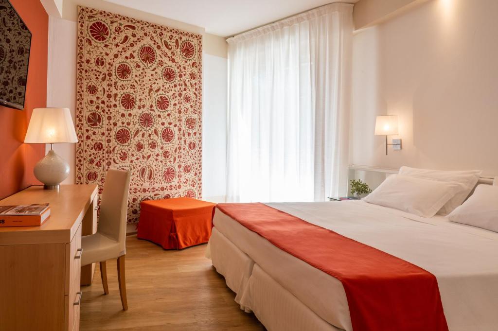 Letto o letti in una camera di Art&Park Hotel Union Lido