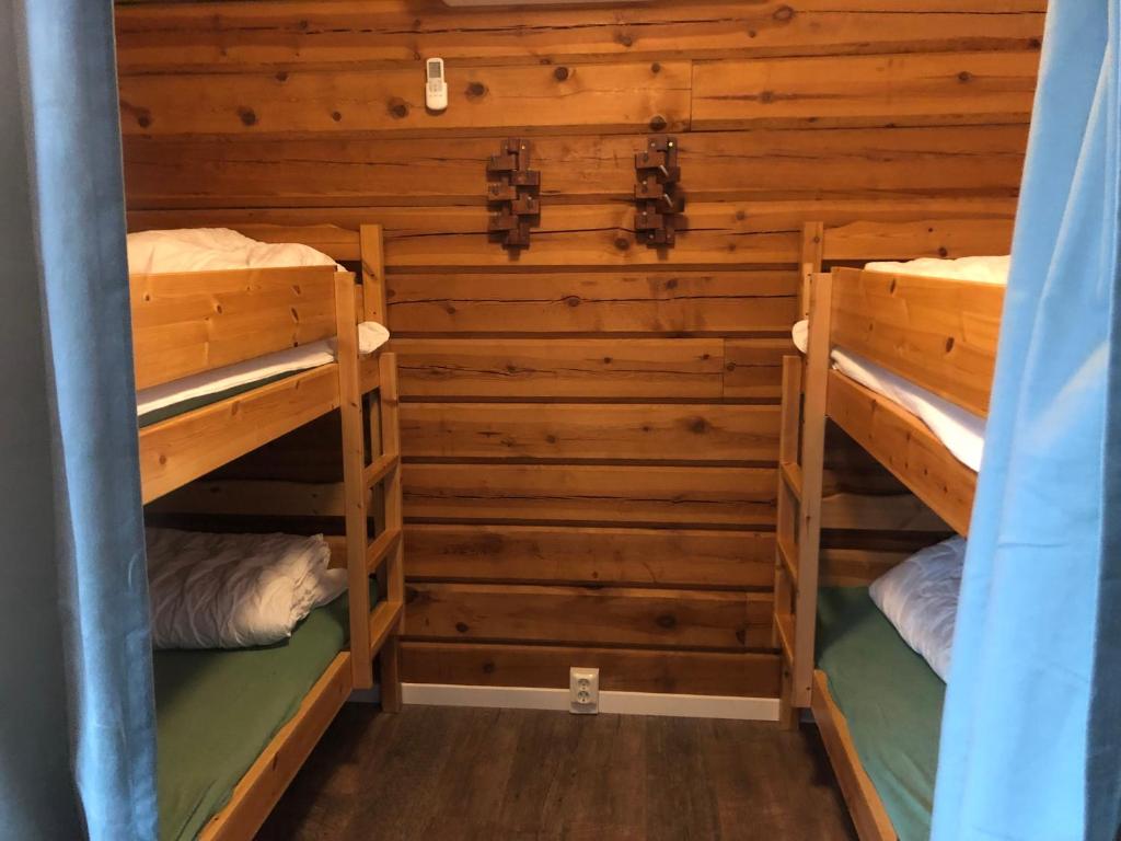 Postel nebo postele na pokoji v ubytování Ösjönäs
