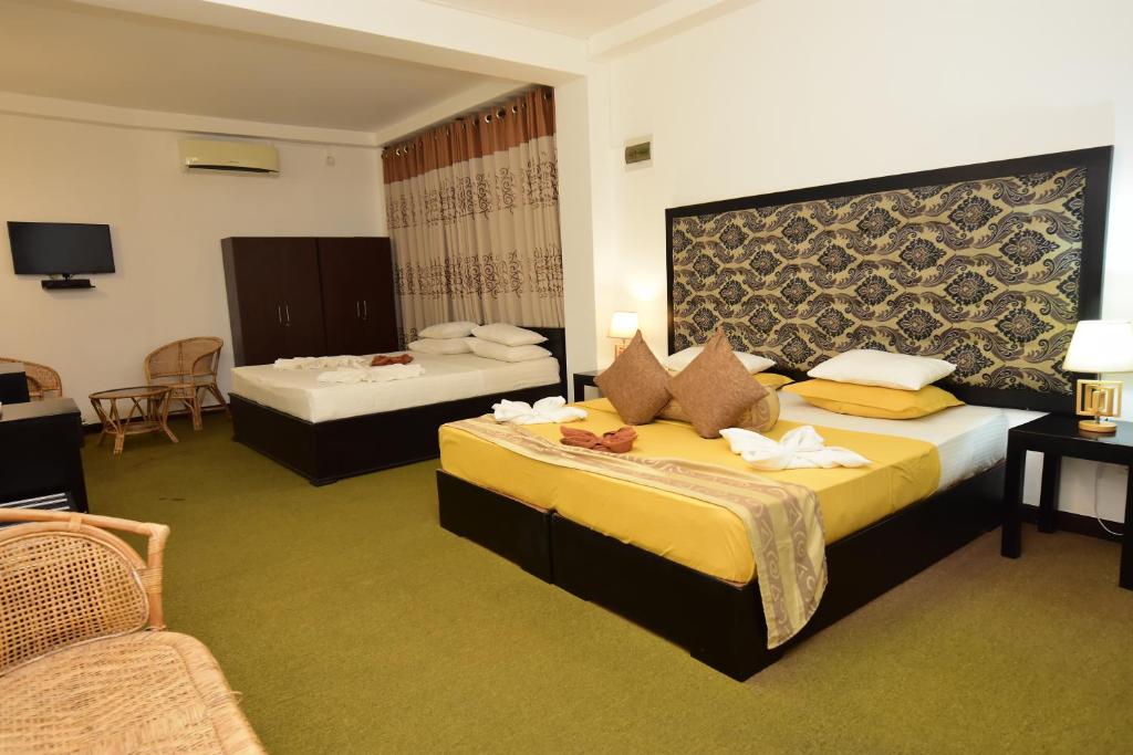 Postel nebo postele na pokoji v ubytování L&D Stay Inn