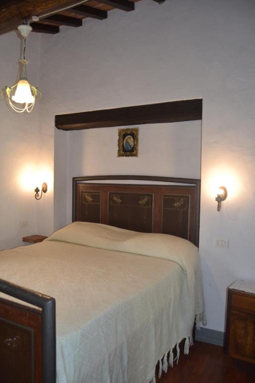 Posteľ alebo postele v izbe v ubytovaní Cortona Gabolina e Turata Holiday Home