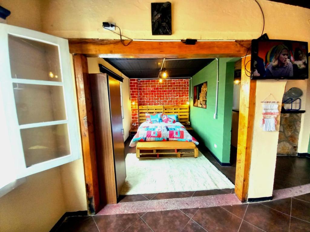 Postel nebo postele na pokoji v ubytování Donde Pepe Loft Apartasuite.