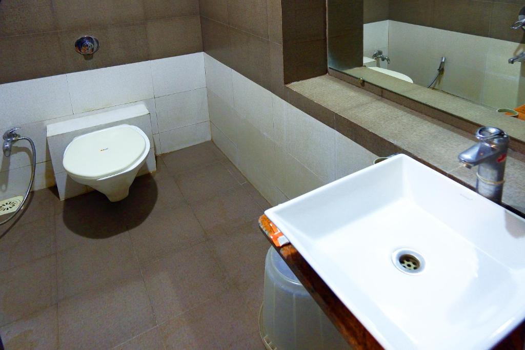 Koupelna v ubytování Hotel Sai Vijay
