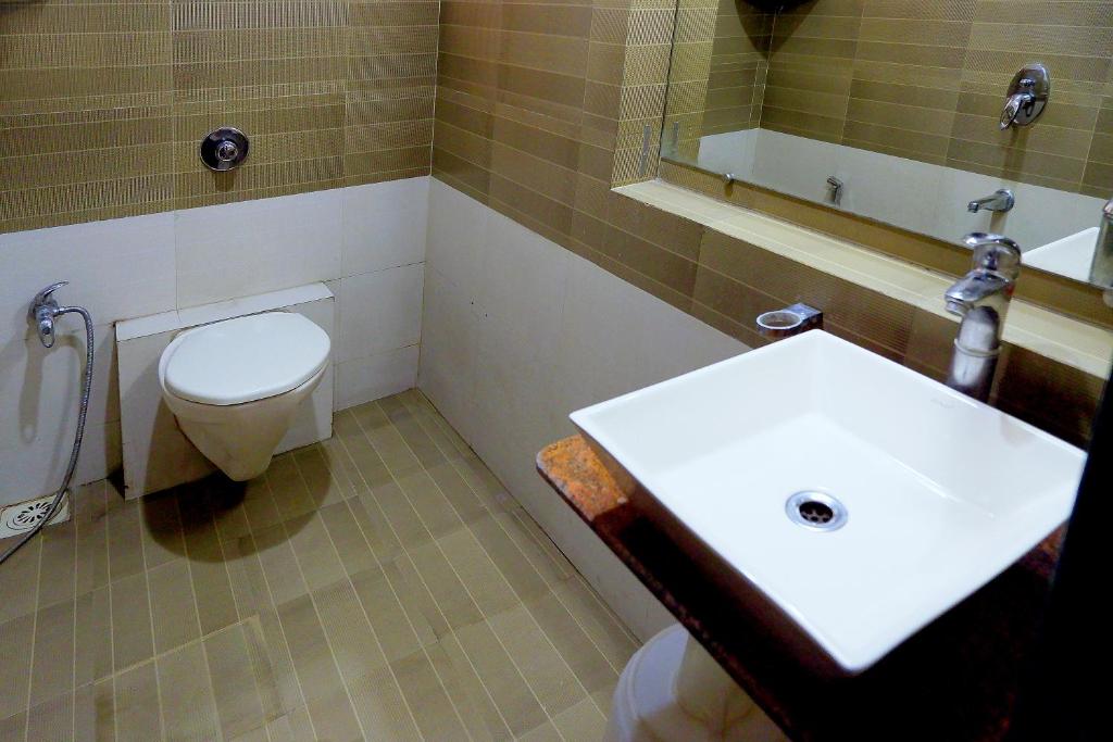 Koupelna v ubytování Hotel Sai Vijay