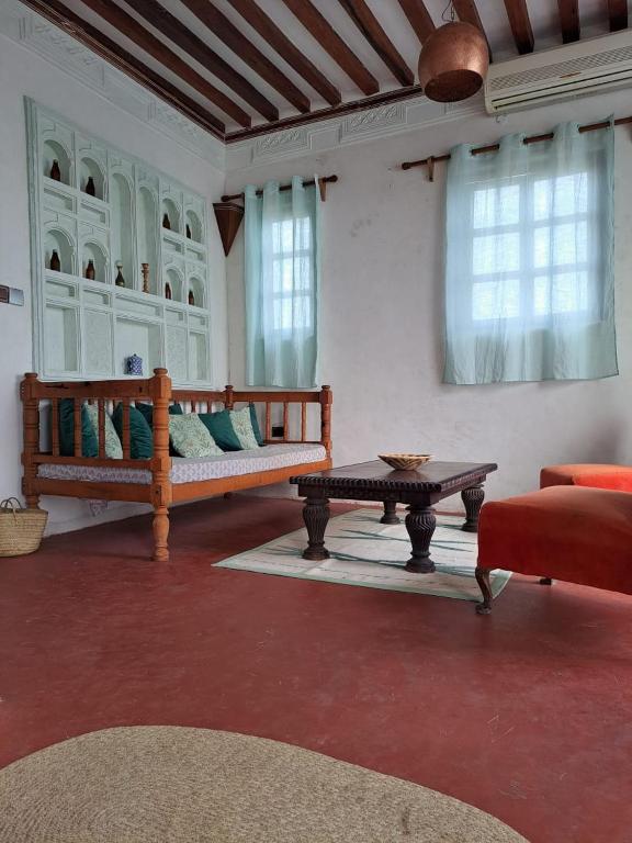 Postel nebo postele na pokoji v ubytování Pwani House - Lamu Seafront
