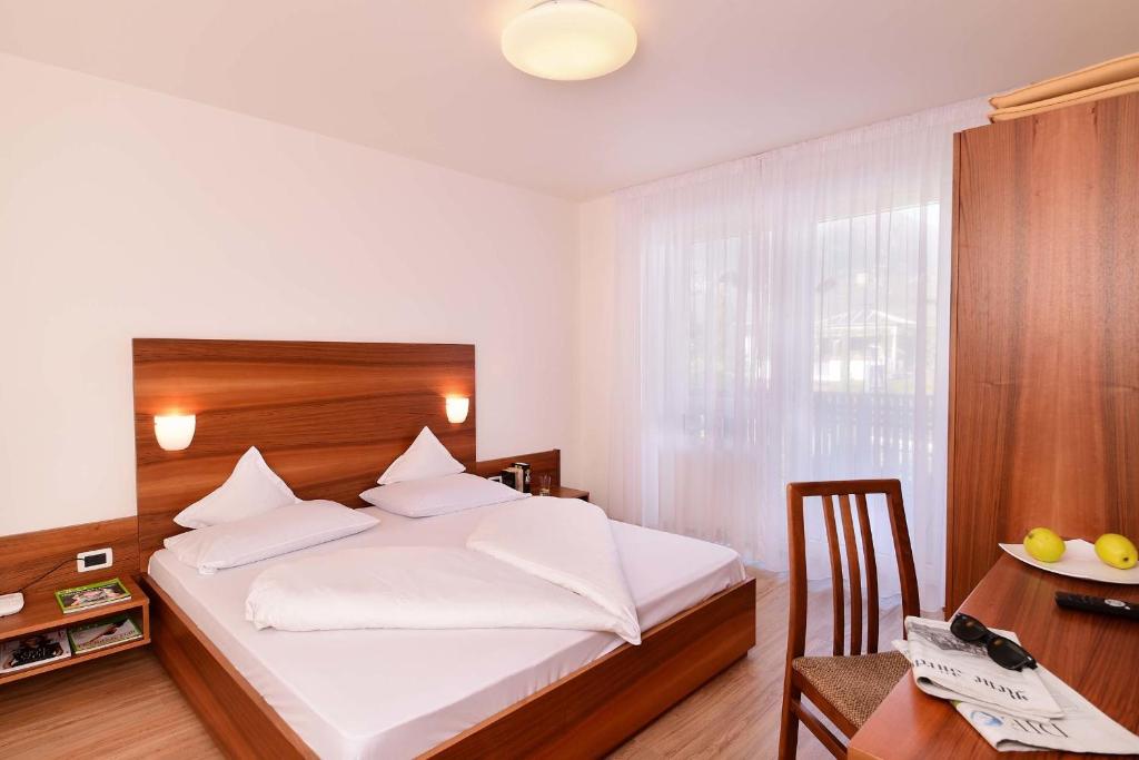 Postel nebo postele na pokoji v ubytování Hotel Rablanderhof
