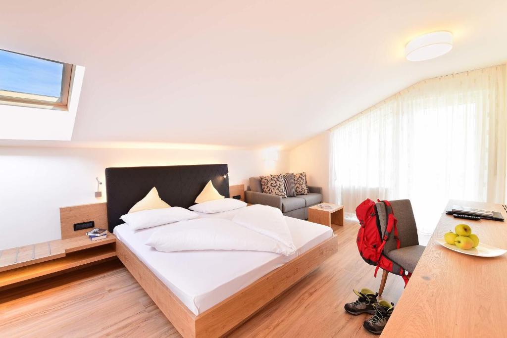 Postel nebo postele na pokoji v ubytování Hotel Rablanderhof