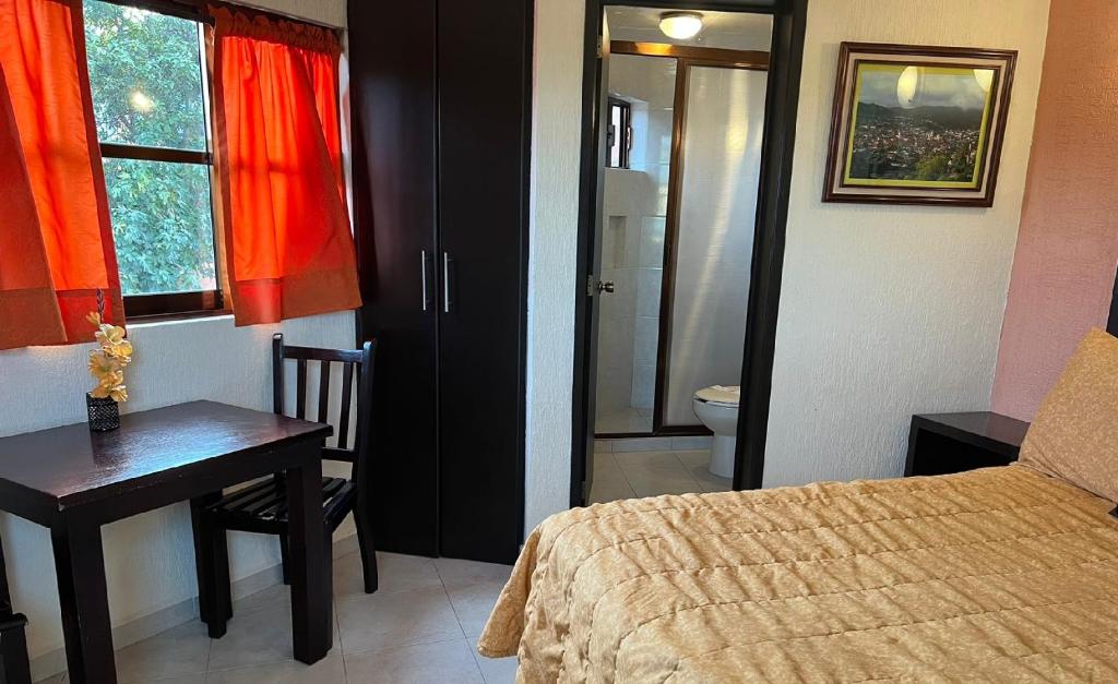 Postel nebo postele na pokoji v ubytování Hotel Posada Real