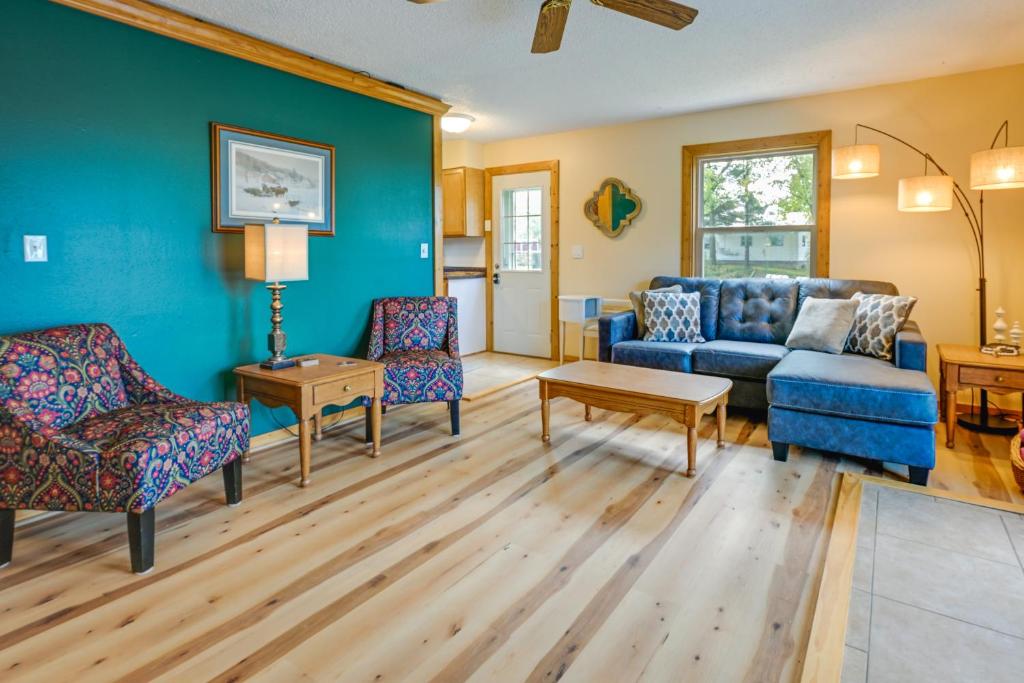 a living room with a couch and chairs at Charming Rockland Retreat with Deck and Grill! 