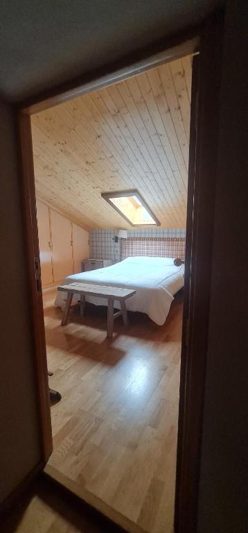Postel nebo postele na pokoji v ubytování Salamandra Panticosa