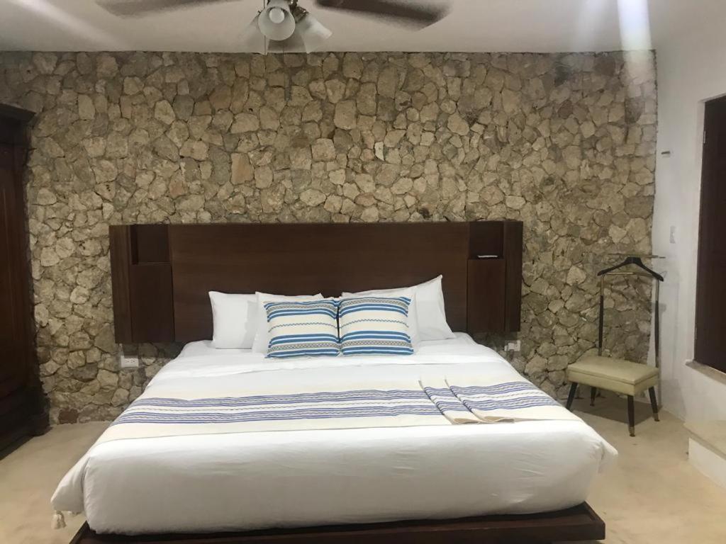 Postel nebo postele na pokoji v ubytování Boutique Casa Azuli Santiago