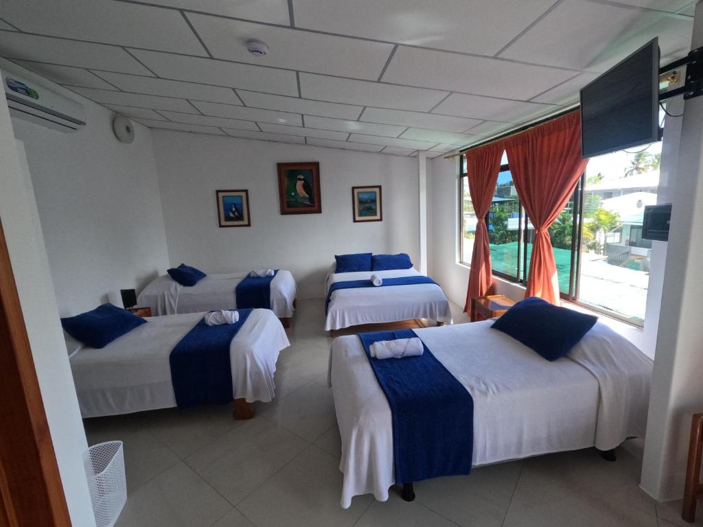 Postel nebo postele na pokoji v ubytování Fernandina Hotel & Spa