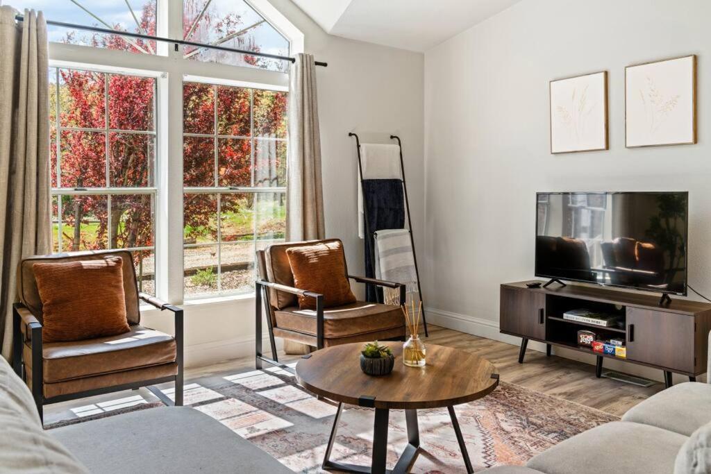 a living room with a couch and chairs and a tv at Stunning North Fork Cabin w/ Free Wi-Fi & Smart TV in North Fork