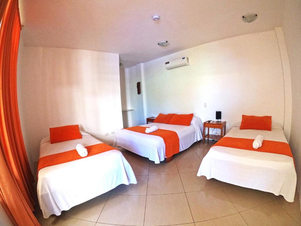 Postel nebo postele na pokoji v ubytování Fernandina Hotel & Spa