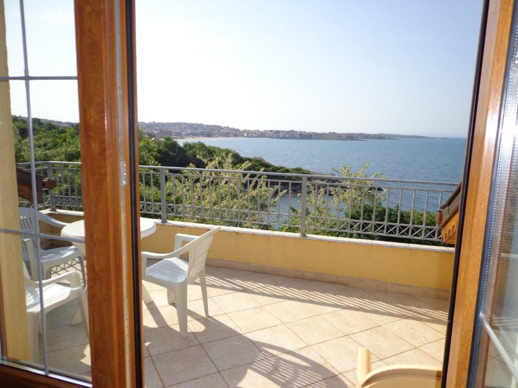 a balcony with a view of the water at Villa Via Pontica in Sozopol