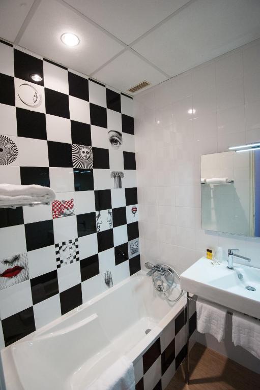 Koupelna v ubytování Hotel Kalliste
