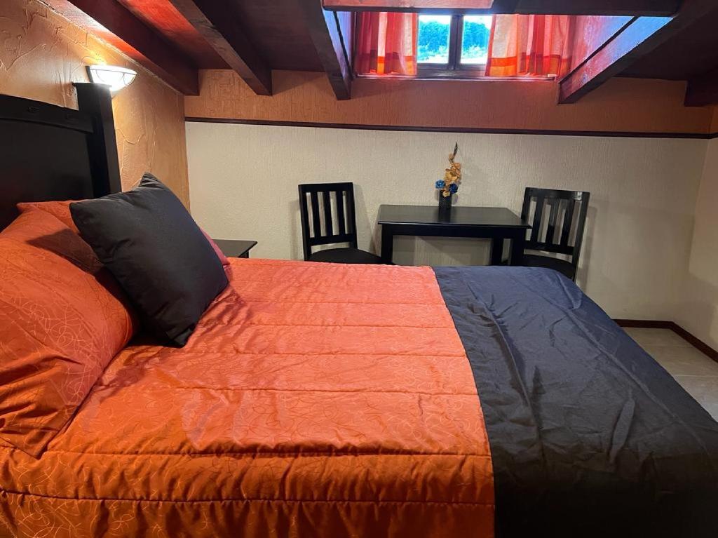 Postel nebo postele na pokoji v ubytování Hotel Paraiso Real Plus