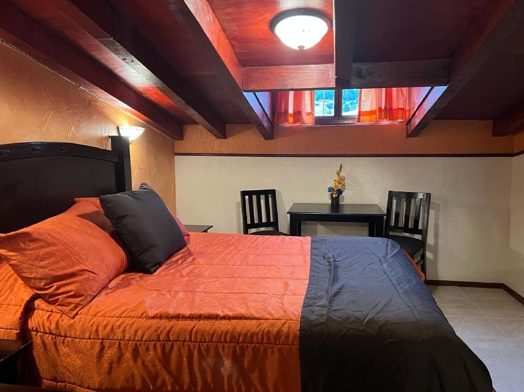 Postel nebo postele na pokoji v ubytování Hotel Paraiso Real Plus