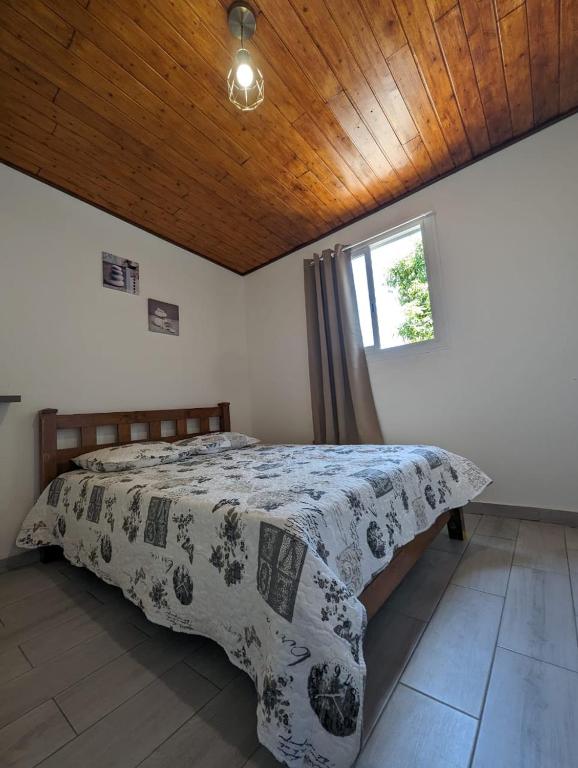 Postel nebo postele na pokoji v ubytování Ti Kaz Galet