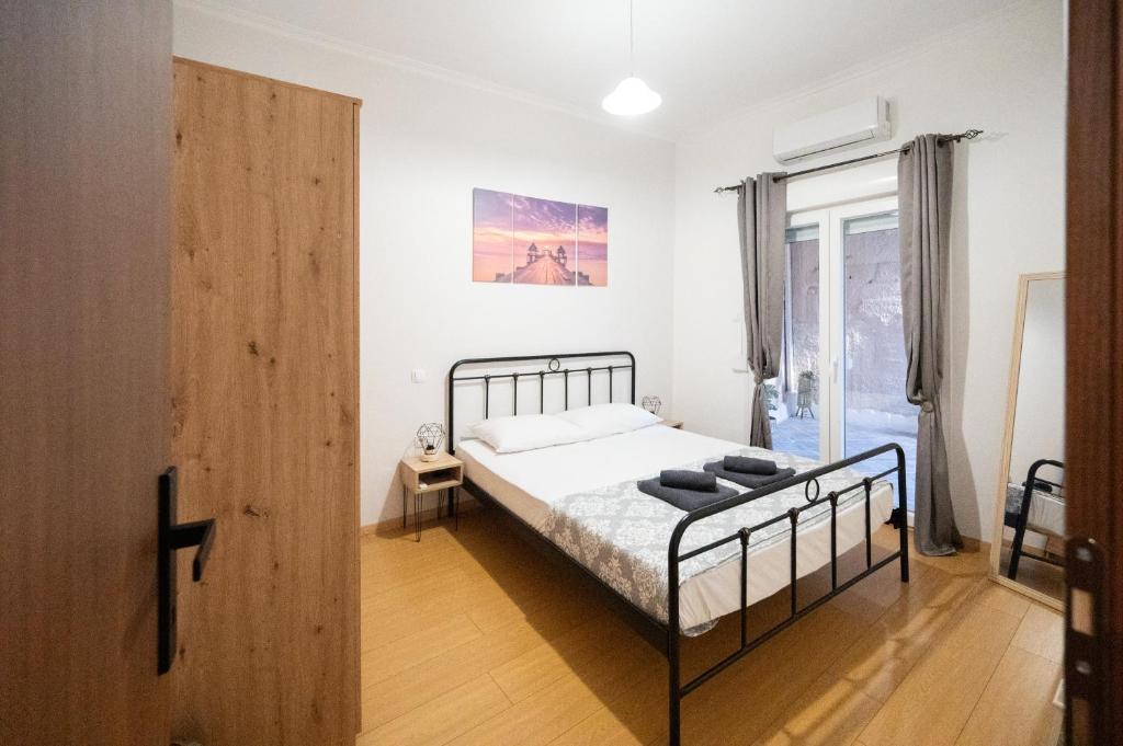Posteľ alebo postele v izbe v ubytovaní Christopher Central Home Ioannina