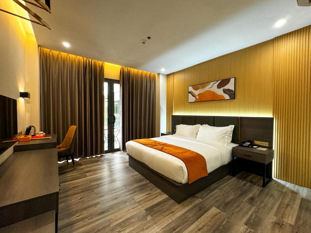 Postel nebo postele na pokoji v ubytování Venus Royale Hotel