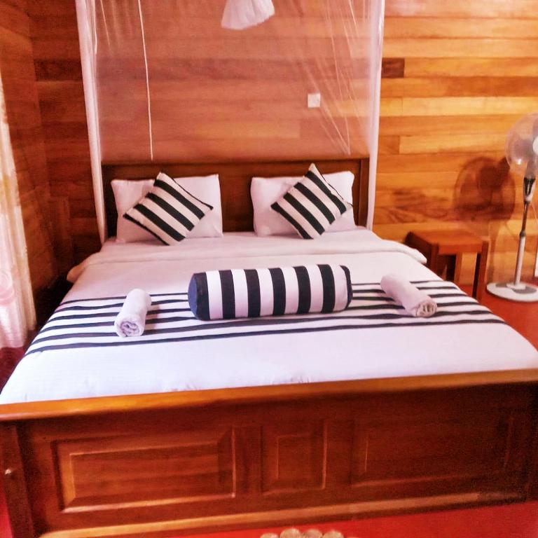 Postel nebo postele na pokoji v ubytování Green cottage Ella