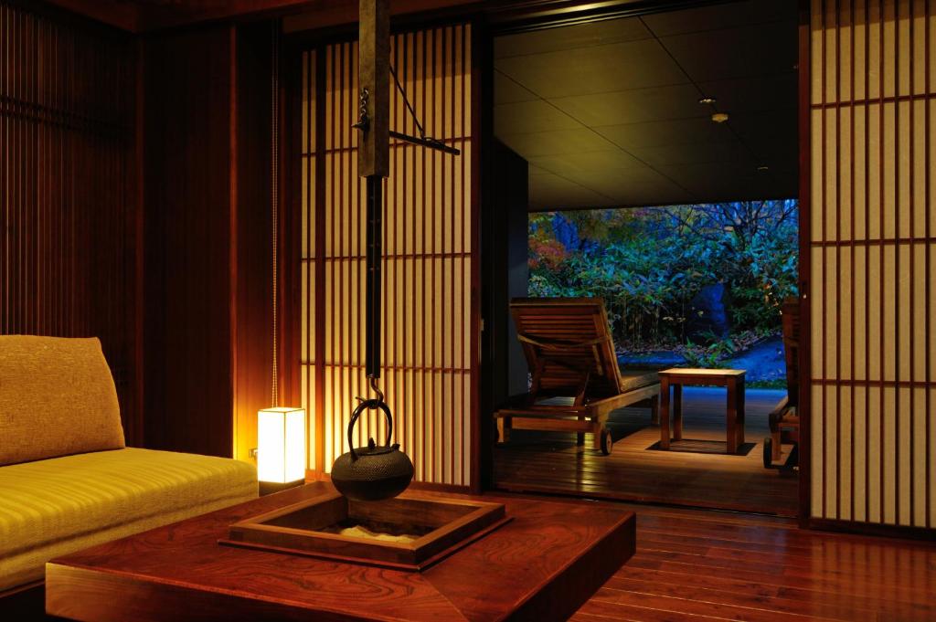 Area soggiorno di 竹泉荘 Chikusenso Onsen