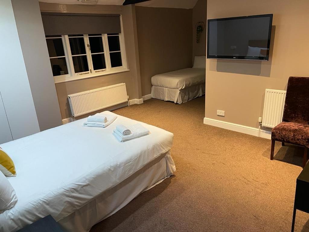 Ein Bett oder Betten in einem Zimmer der Unterkunft Limes hotel